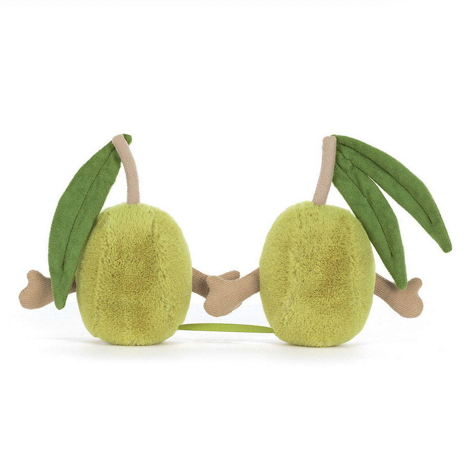 Green fruit-shaped toy with leaves on a white background