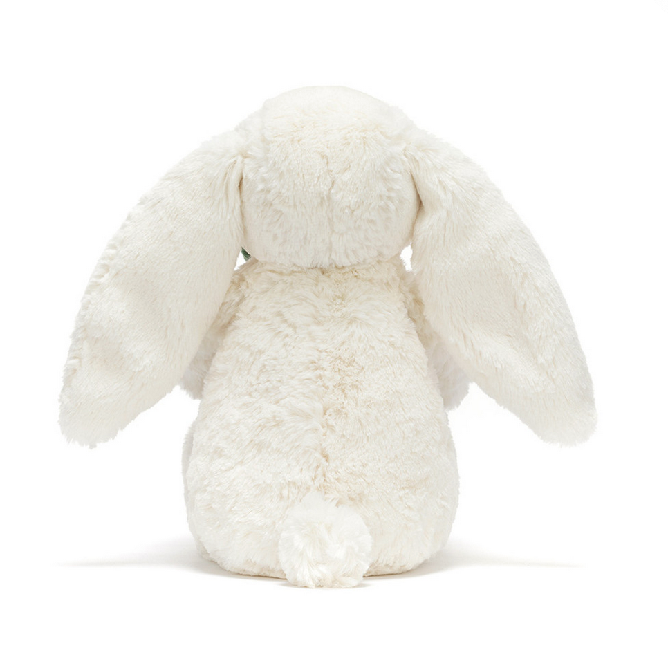 White plush bunny toy on a white background