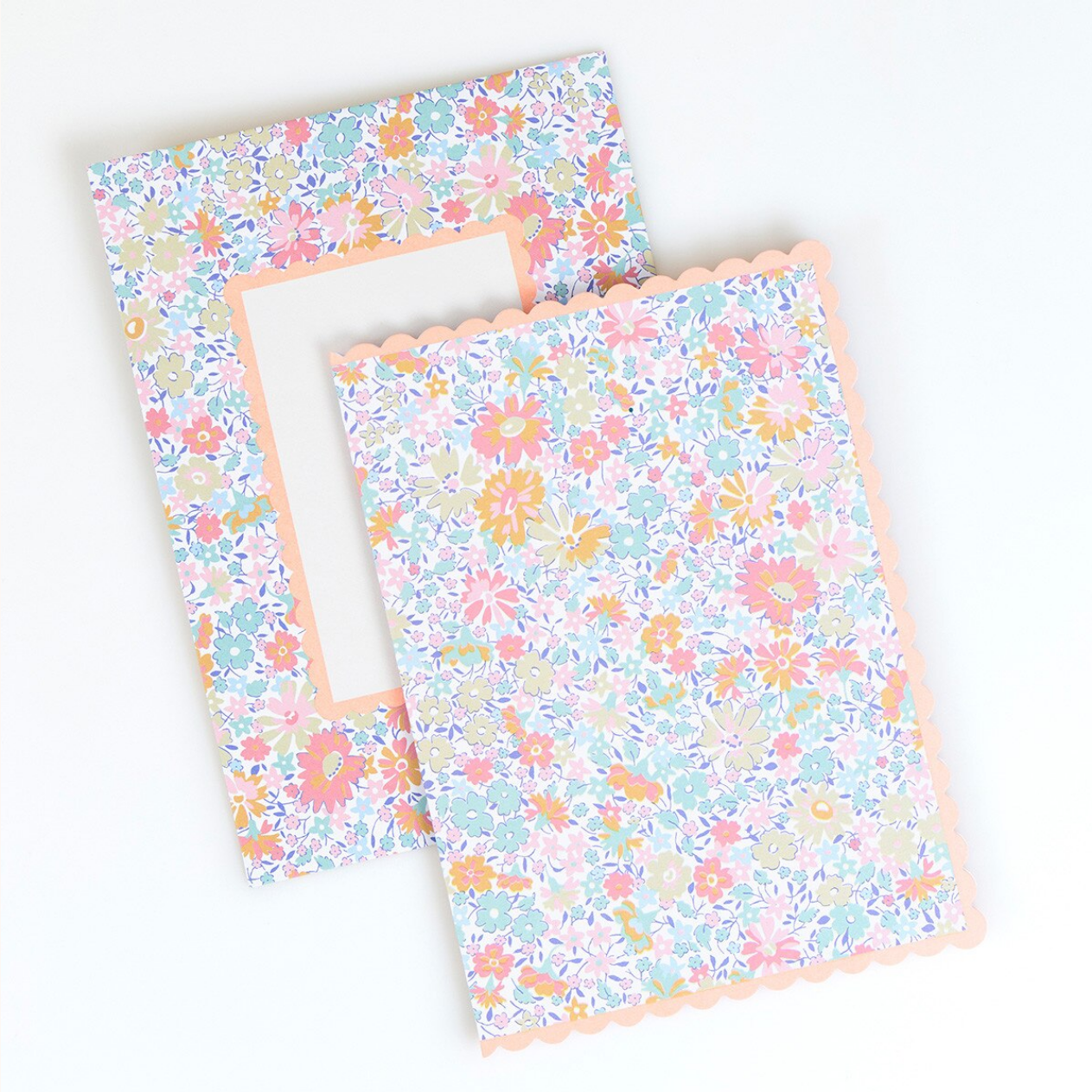 Floral-patterned fabric with a white border on a white background