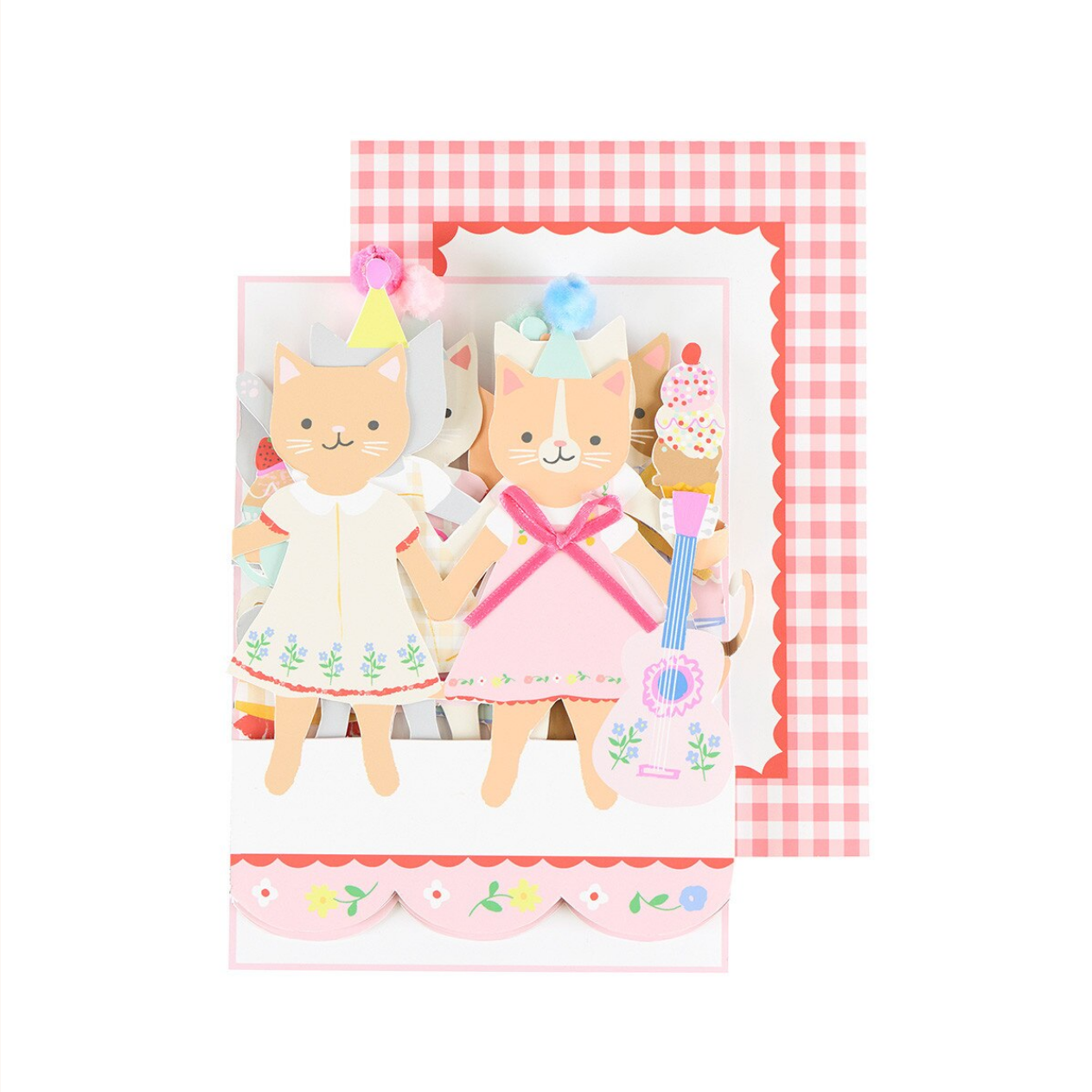 Card with cat-themed paper dolls on a checkered background