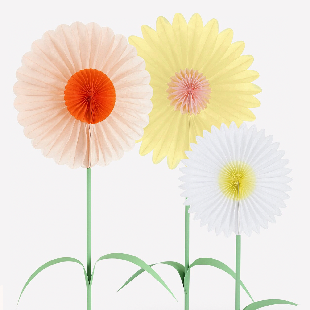 Decorative paper flowers with colorful centers on a white background