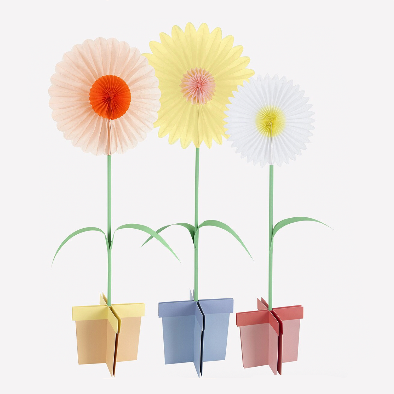 Colorful paper flower decorations in pots on a white background