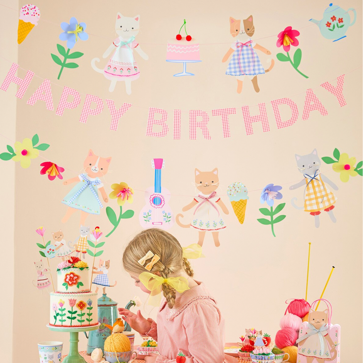 Children's birthday card with illustrations of a girl, cake, and toys on a beige background.