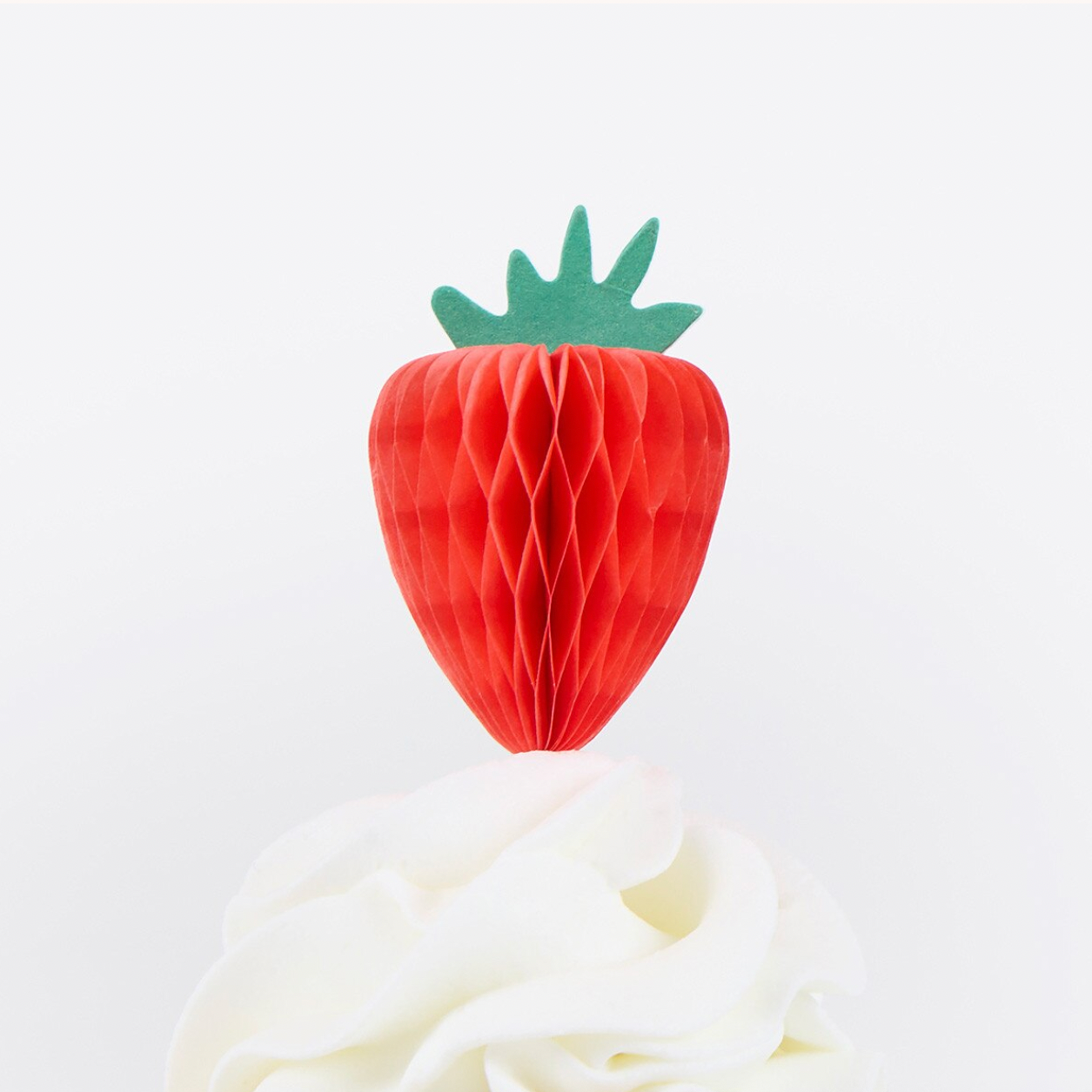 Red honeycomb strawberry decoration on a white background