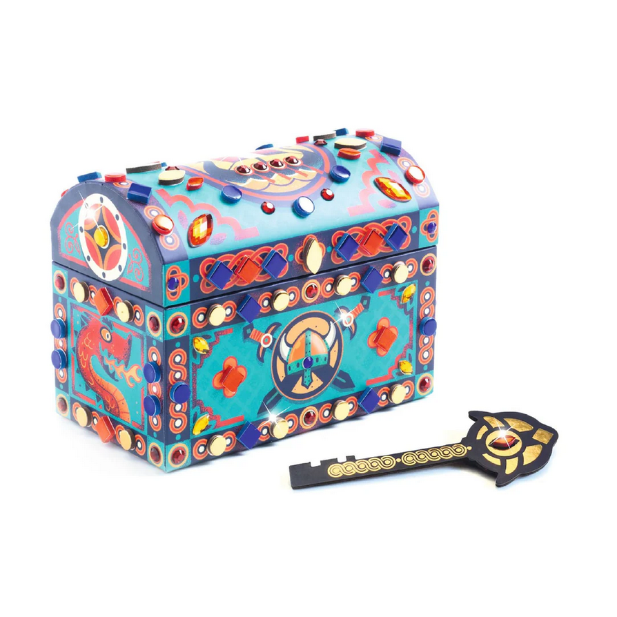 Colorful jewelry box with decorative patterns and a key on a white background