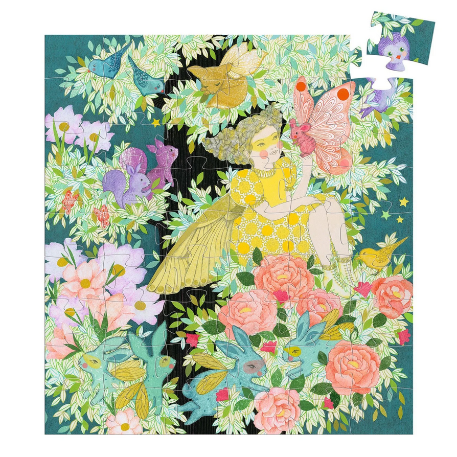Jigsaw puzzle with a fairy and floral design on a blue background