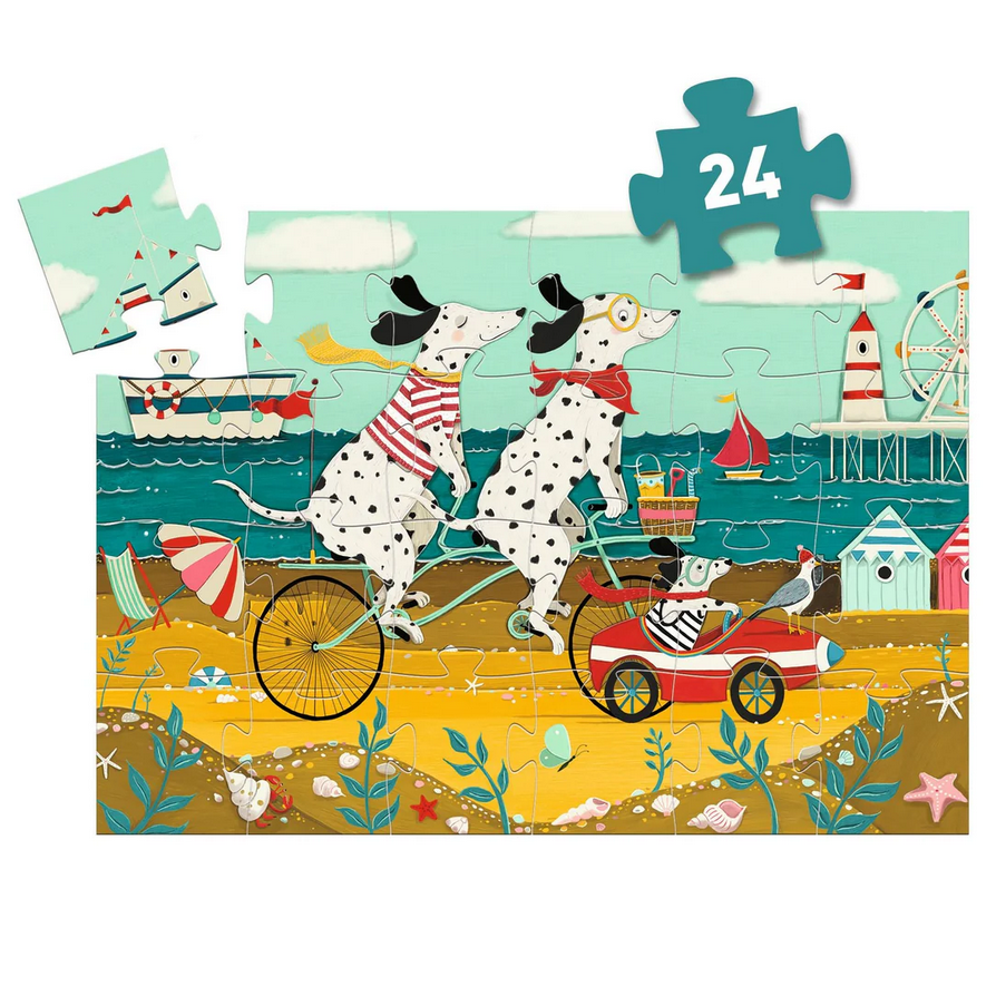 Children's puzzle with two Dalmatian dogs on a beach scene, featuring a piece with the number 24.