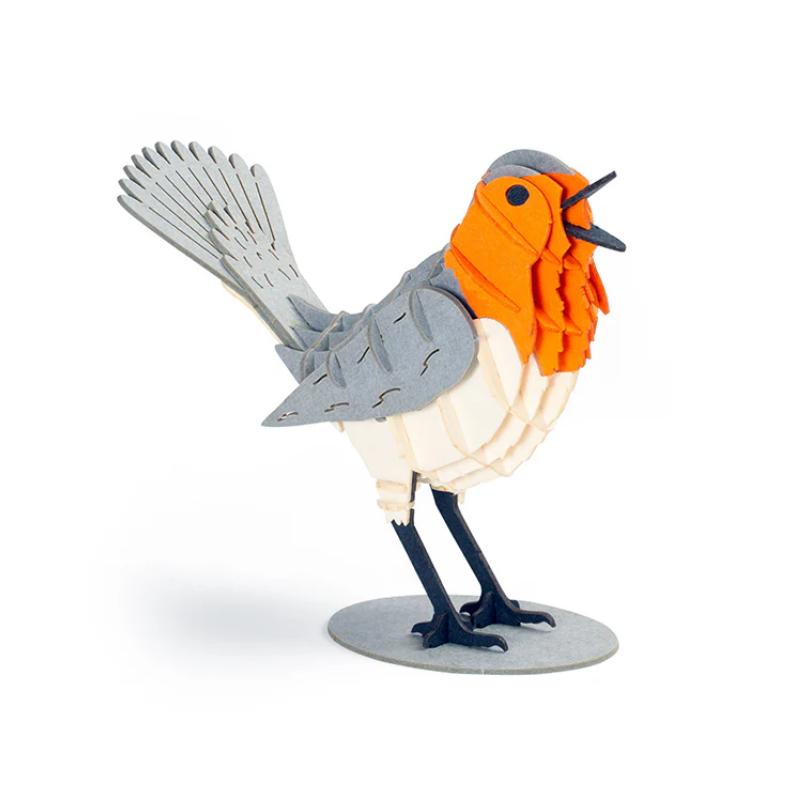 Bird-shaped lamp with orange breast and gray wings on a white background