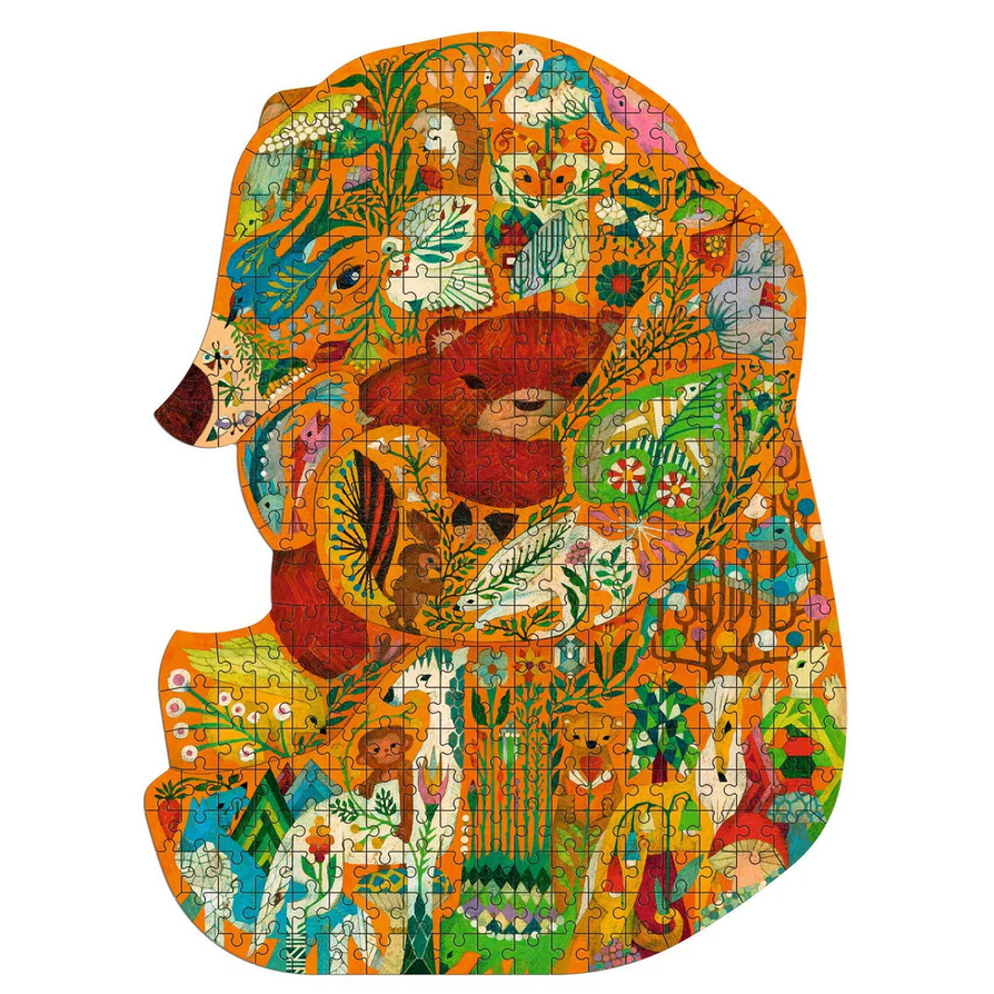 Colorful puzzle shaped like a bear with floral and nature-themed design on a white background