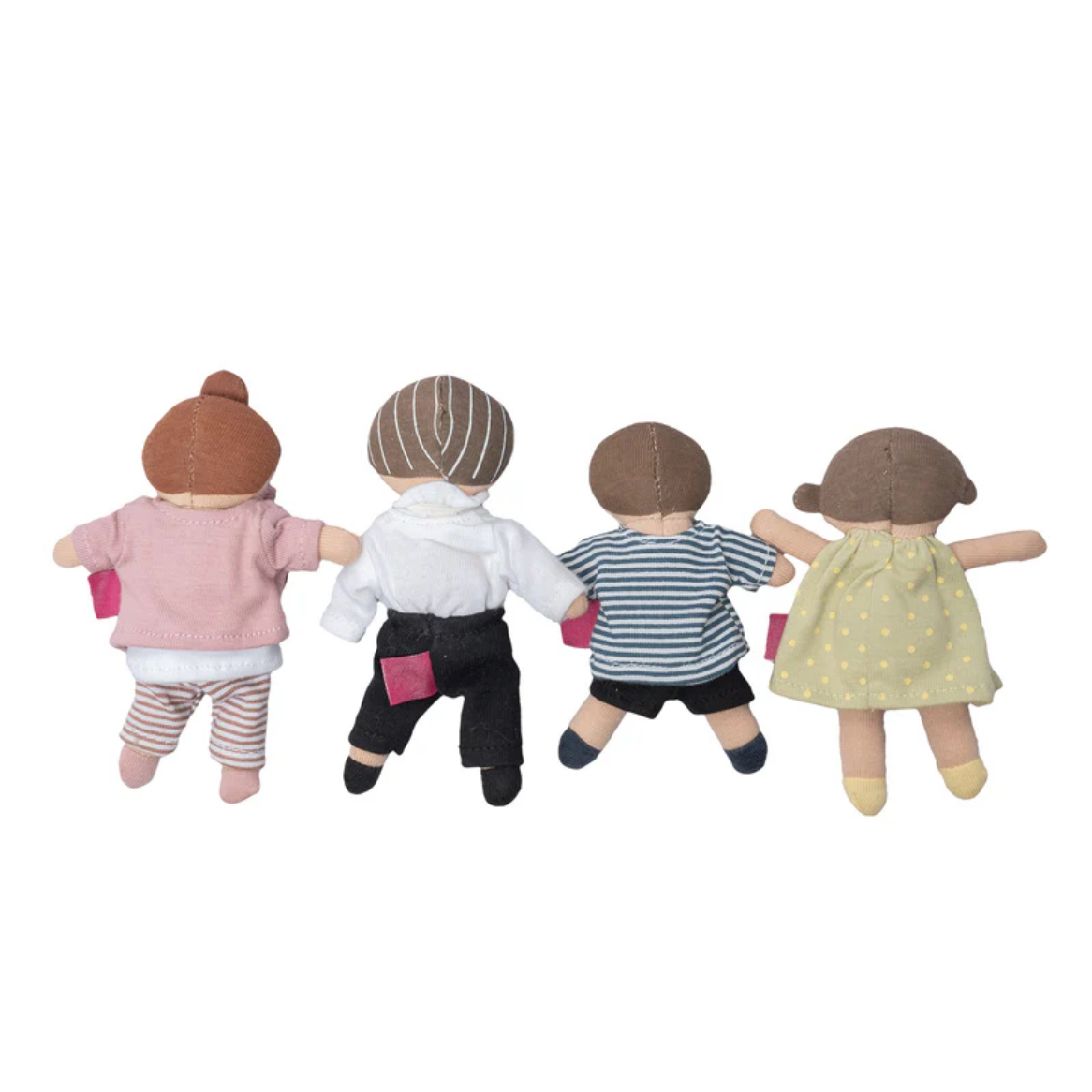 Four dolls in different outfits standing in a line on a white background