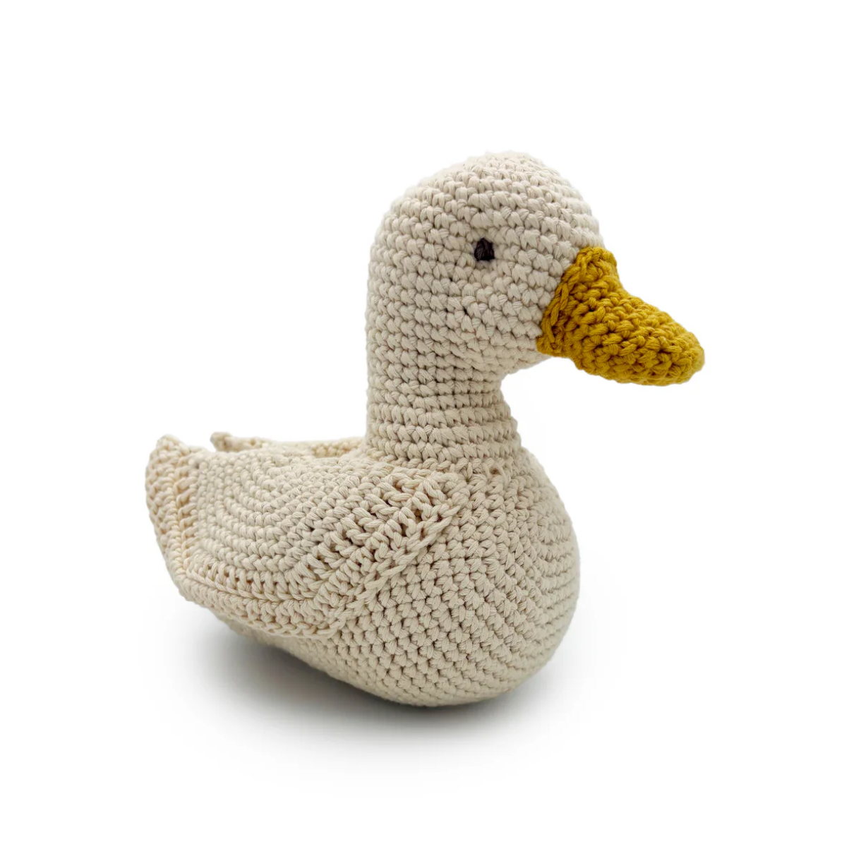 Crocheted duck toy on a white background