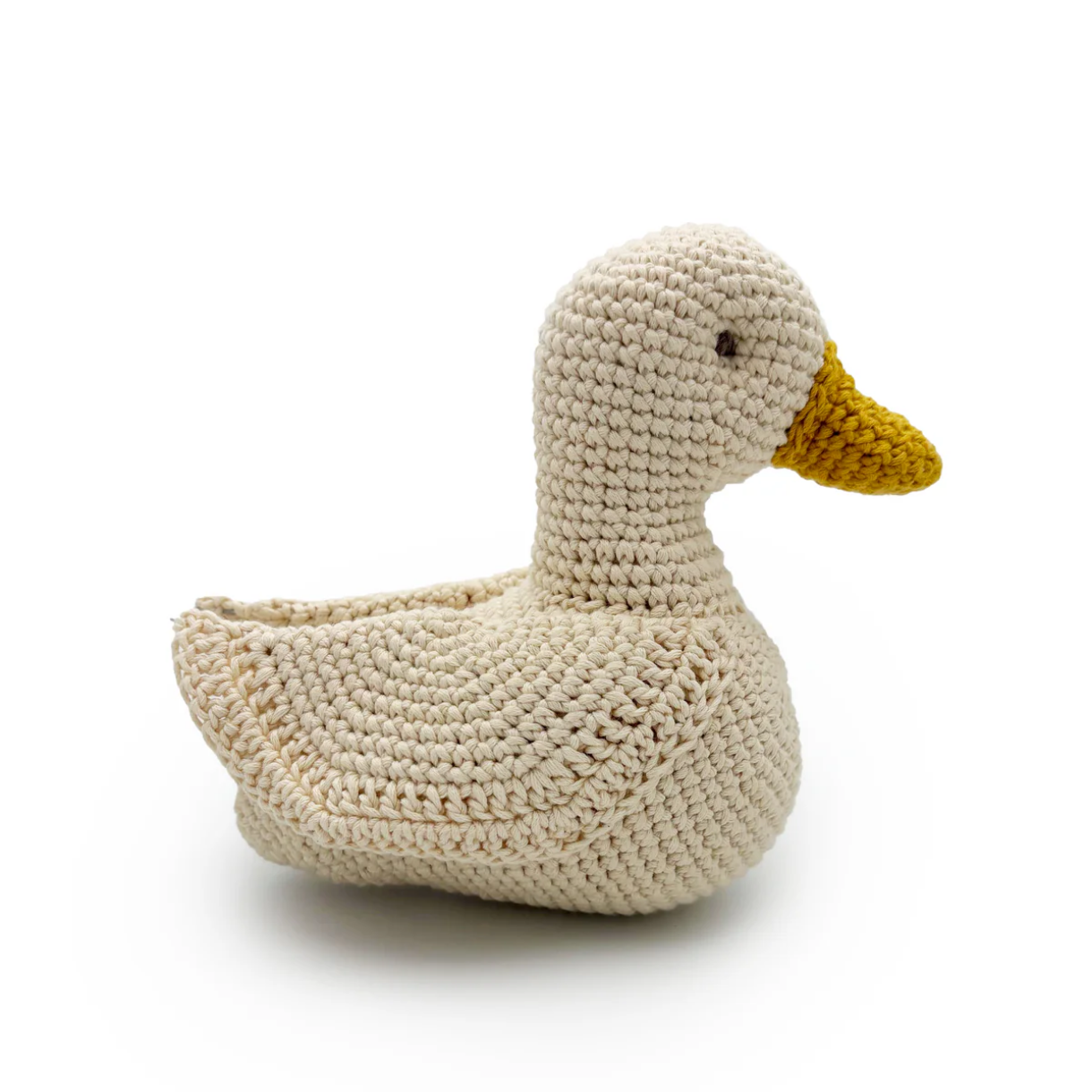 Crocheted duck toy on a white background