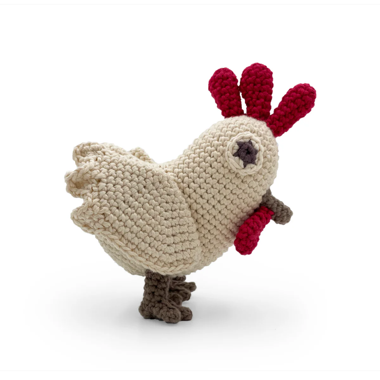 Crocheted rooster toy on a white background