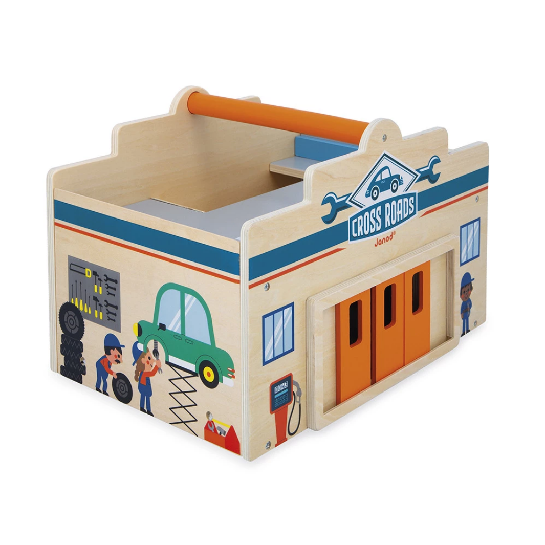 Wooden toy garage with colorful design on a white background