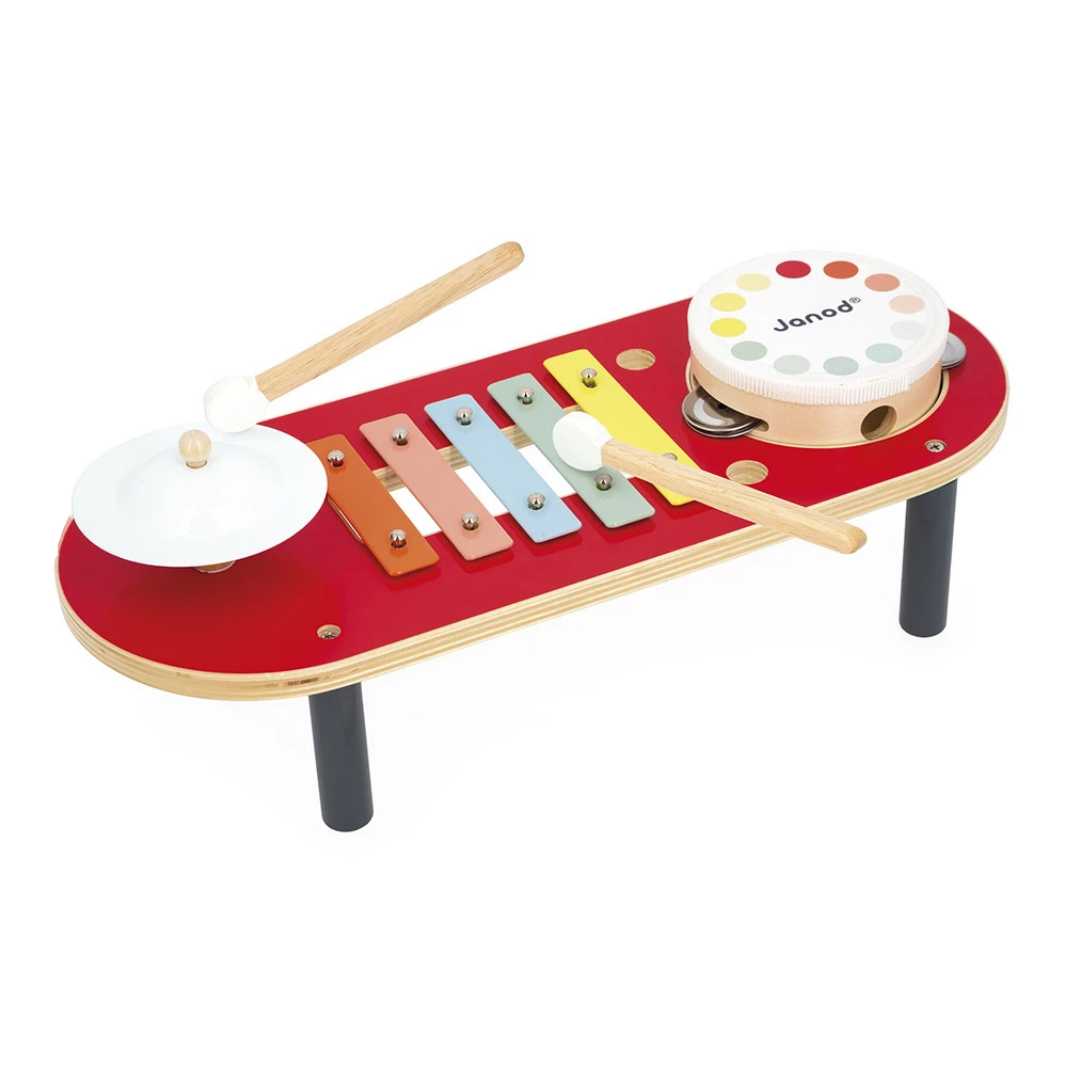 Children's toy drum set with multiple instruments on a white background