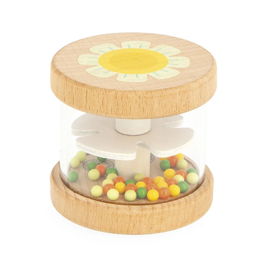 Wooden rattle with a sunflower design on a white background