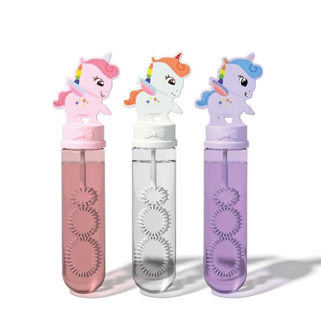 Three bubble bottles with unicorn designs on a white background