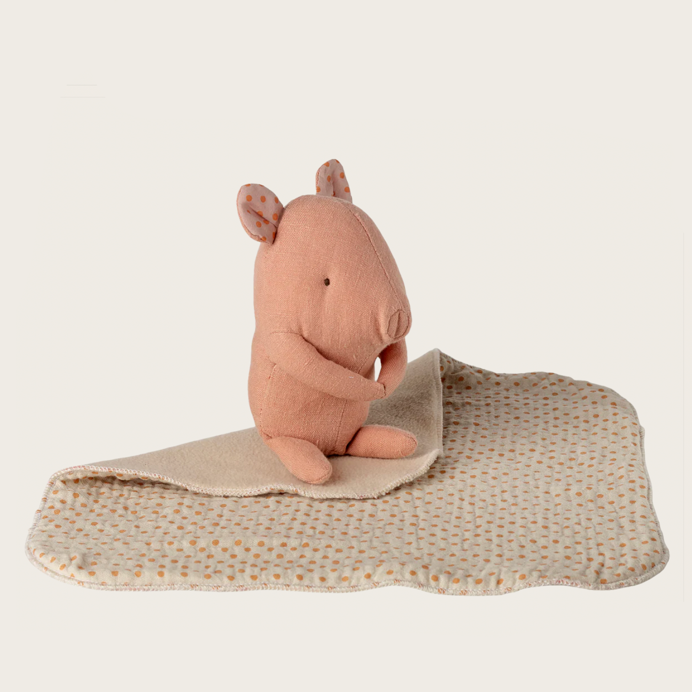 Pink pig plush toy with a blanket 