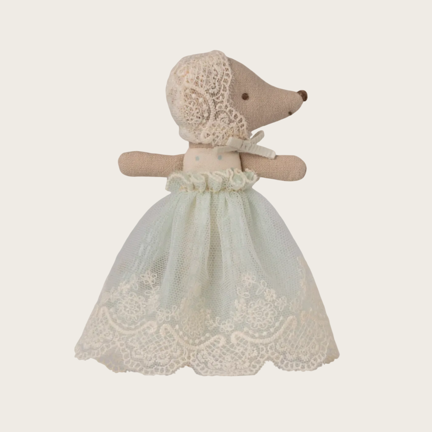 Stuffed animal toy with a lace dress