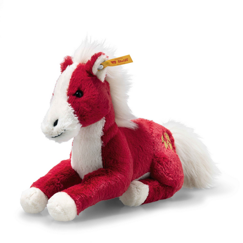Red plush horse toy with a white mane on a white background
