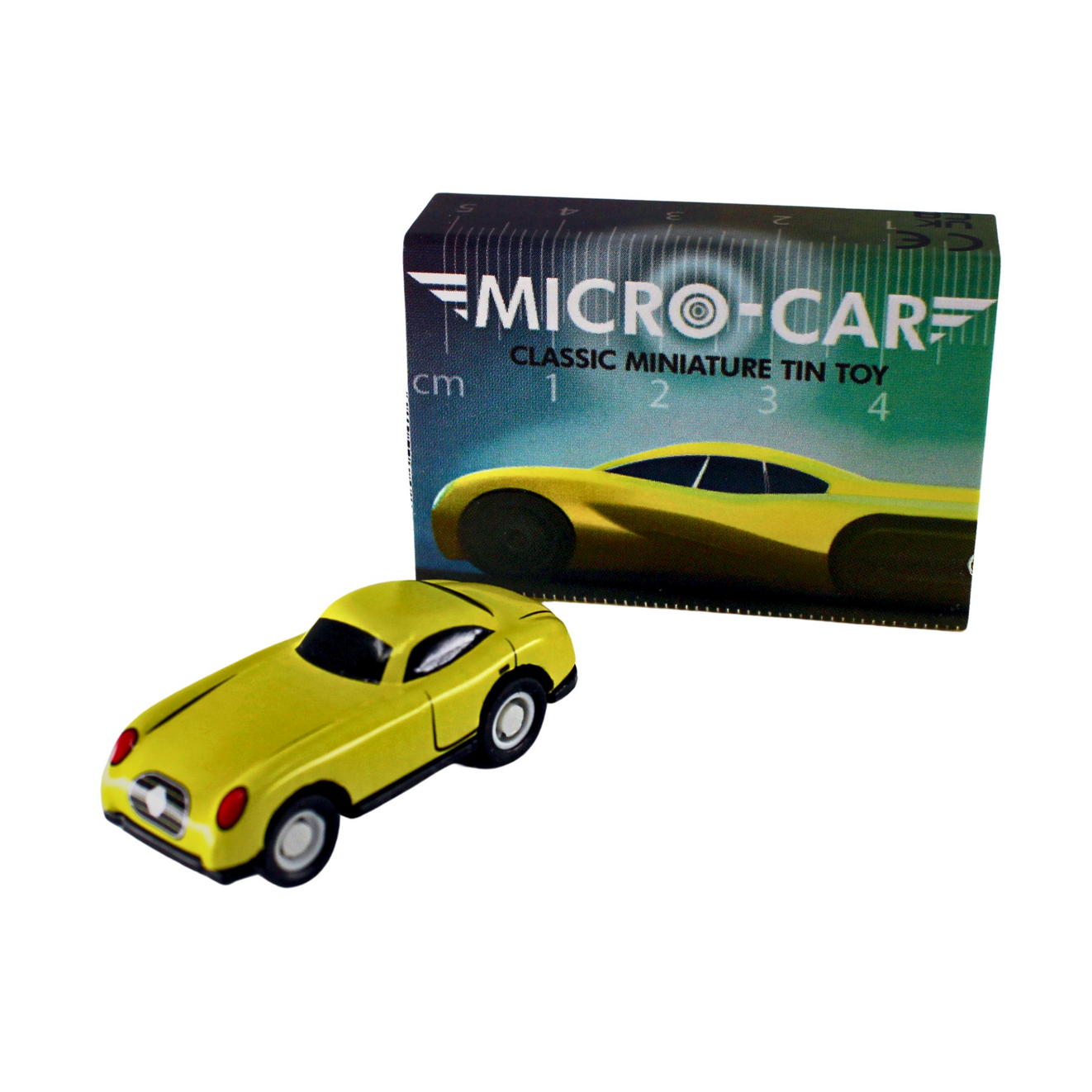 Yellow miniature tin toy car in front of a 'Micro-Car' packaging box.