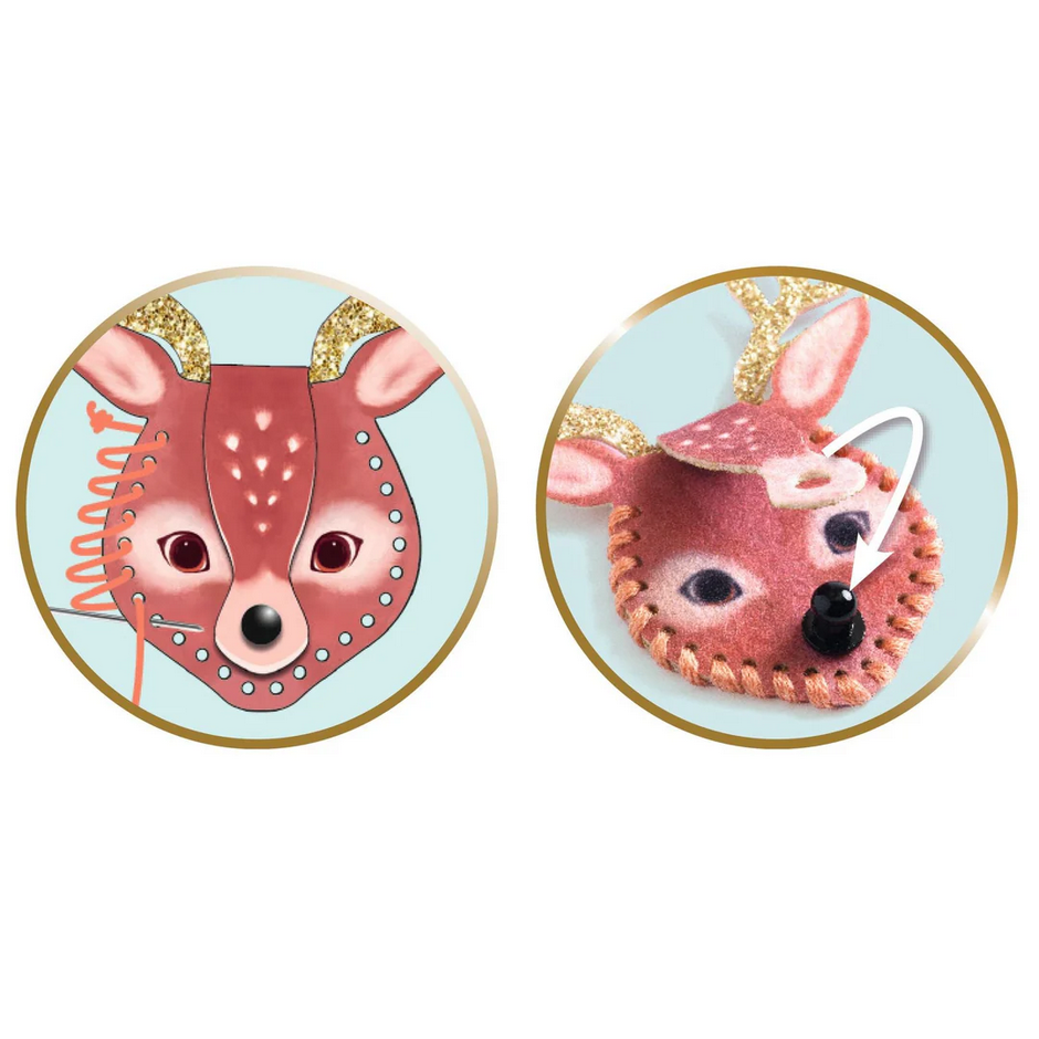 Pair of deer-shaped necklaces on a light blue background
