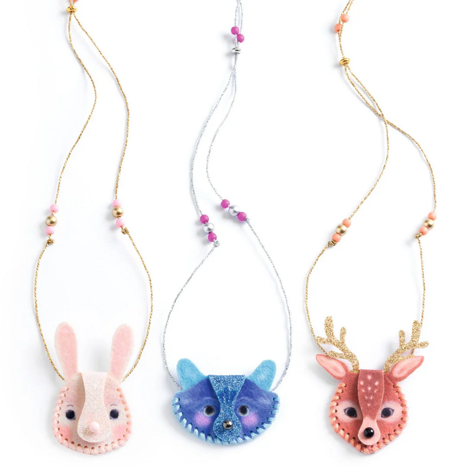 Three animal-themed necklaces on a white background
