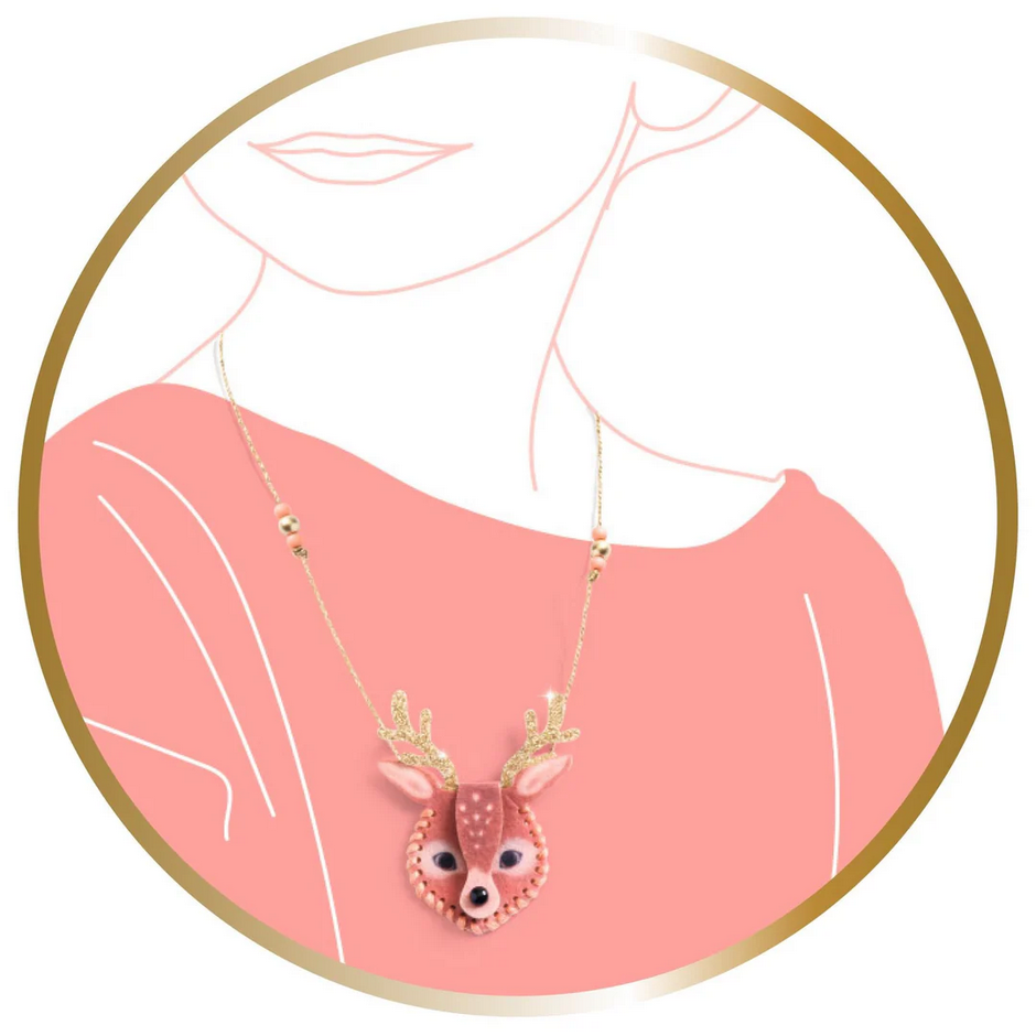 Deer-shaped pendant necklace on a pink background with a gold frame