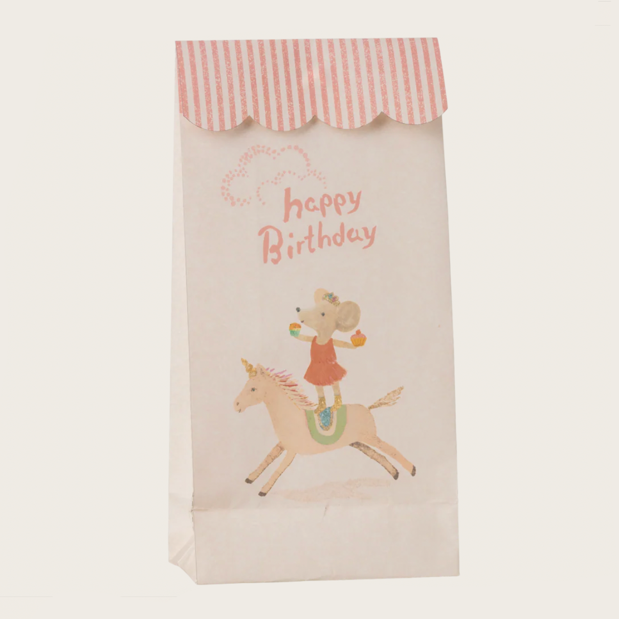 Gift bag with a child riding a unicorn and 'Happy Birthday' text on a white background