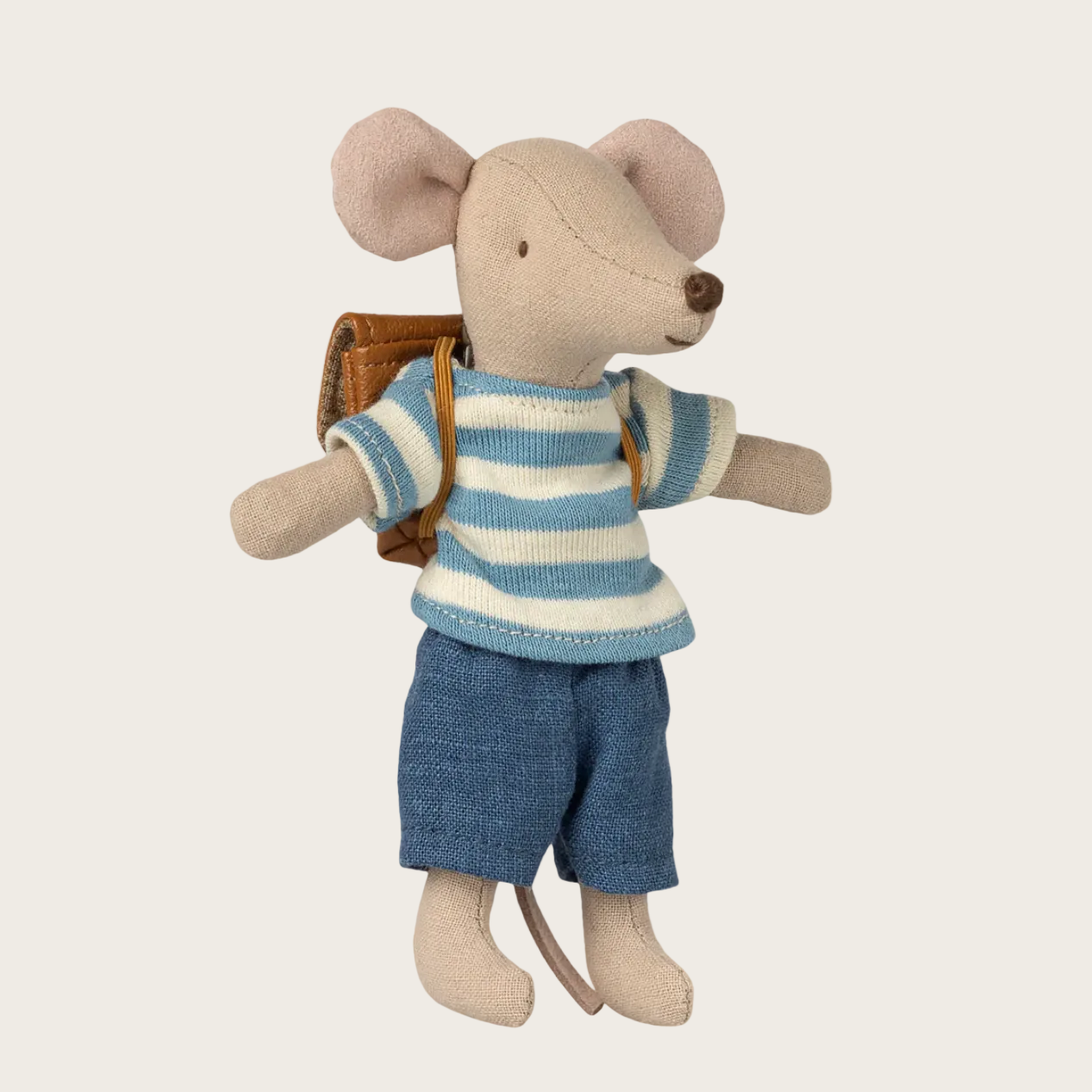 Stuffed toy mouse in a striped shirt and shorts