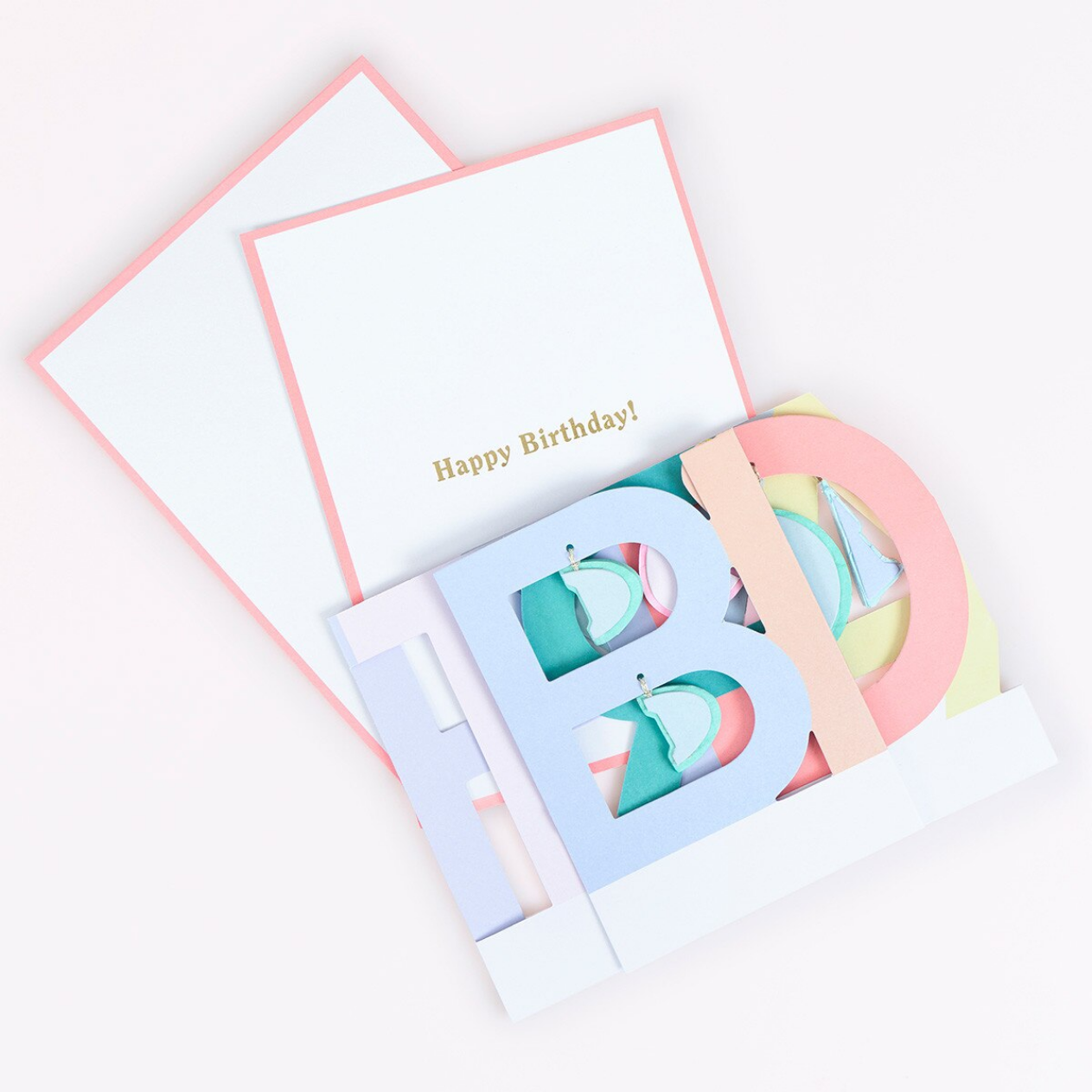 Letter 'B' shaped birthday card with colorful design on a white background