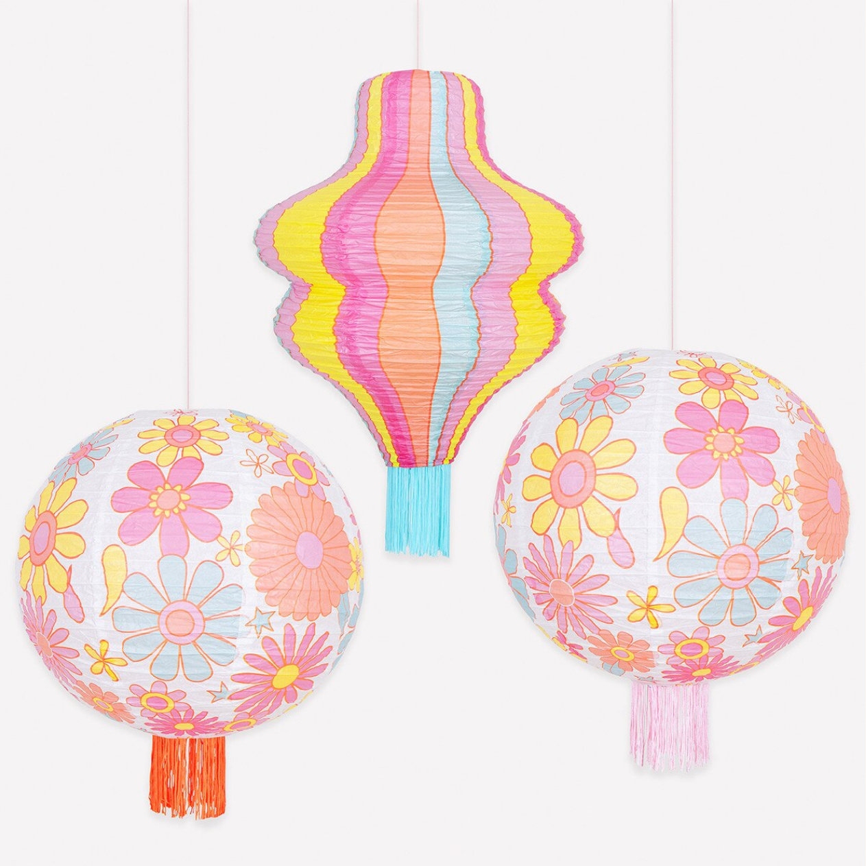 Colorful paper lanterns with floral patterns and a hot air balloon design on a white background.