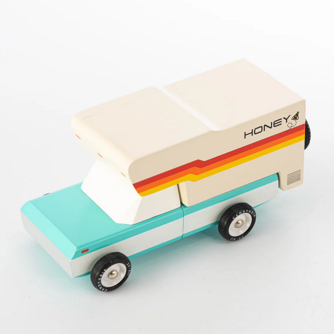Toy truck with colorful design on a white background