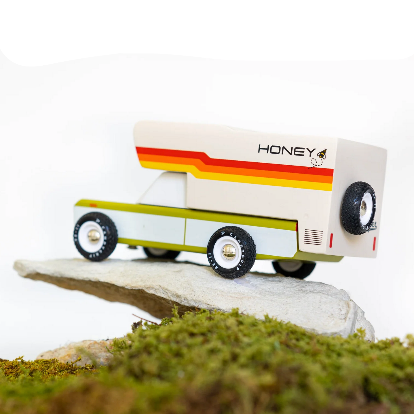 Toy honeybee camper on a computer screen with 'Candyland Toys' branding.