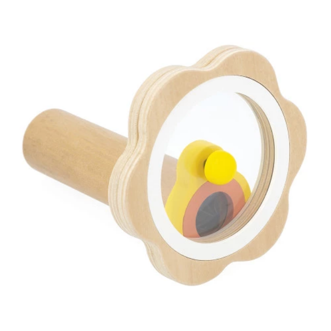 Wooden toy with a circular design featuring a yellow and brown object on a white background.
