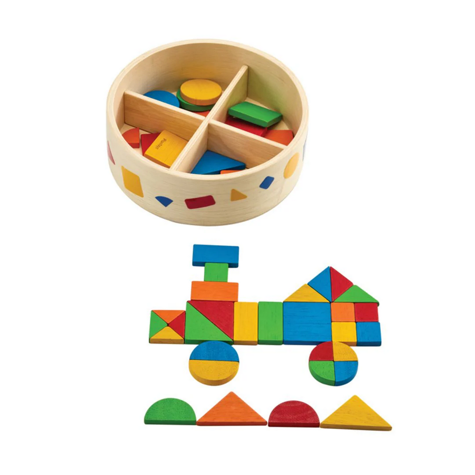 Colorful geometric shapes in a wooden container and assembled into a vehicle on a white background