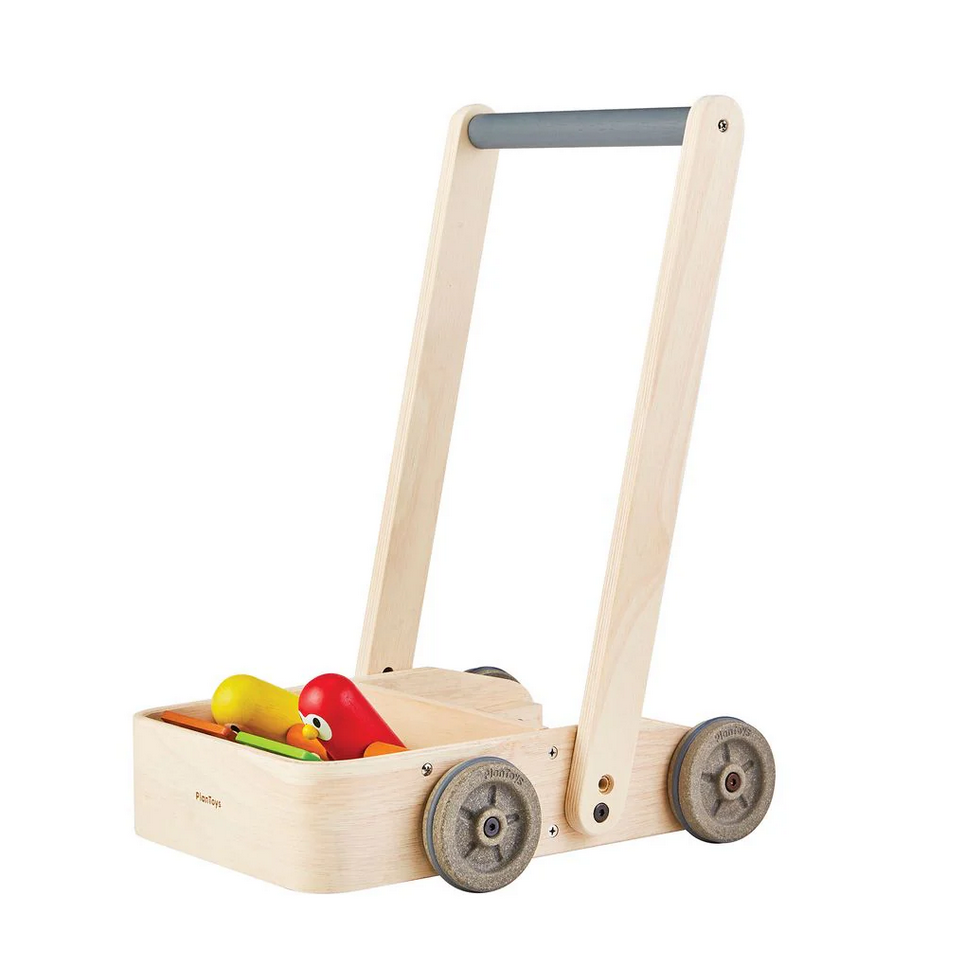 Wooden toy push cart with wheels and a handle on a white background