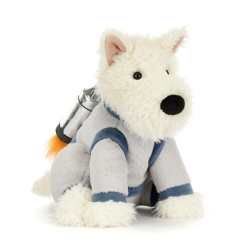Plush toy dog in a space-themed outfit on a white background