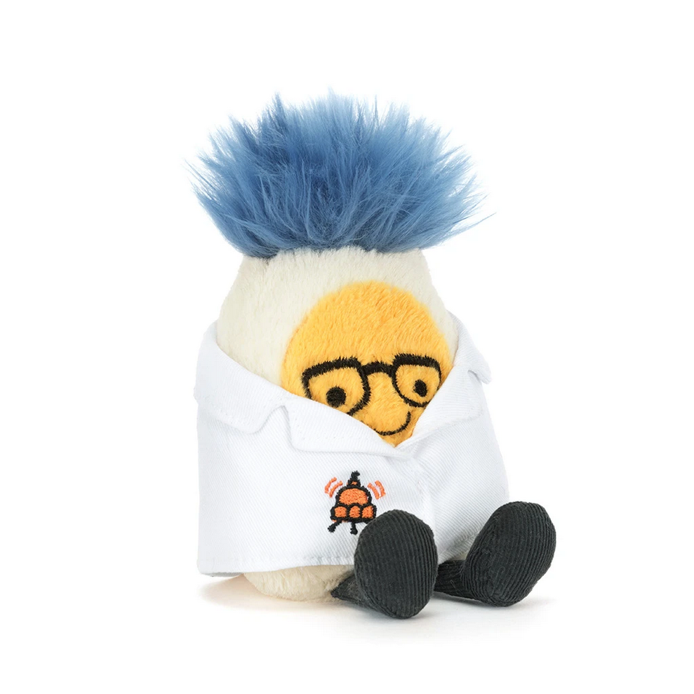 Plush toy resembling a character with blue hair and glasses on a white background