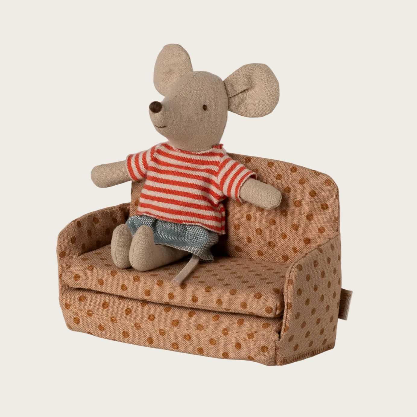 Stuffed toy mouse in a chair 