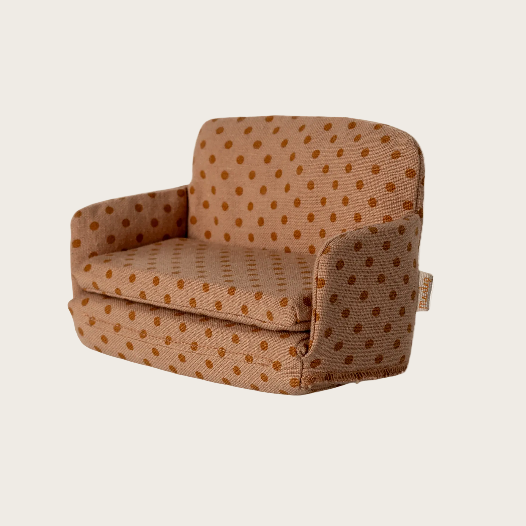 Polka dot chair on a website page with multiple tabs open in the browser.