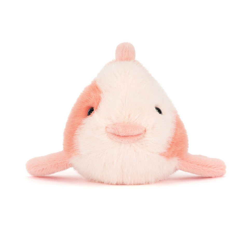 Plush toy shaped like a fish on a white background