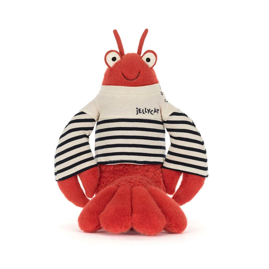 Plush toy lobster wearing a striped shirt on a white background
