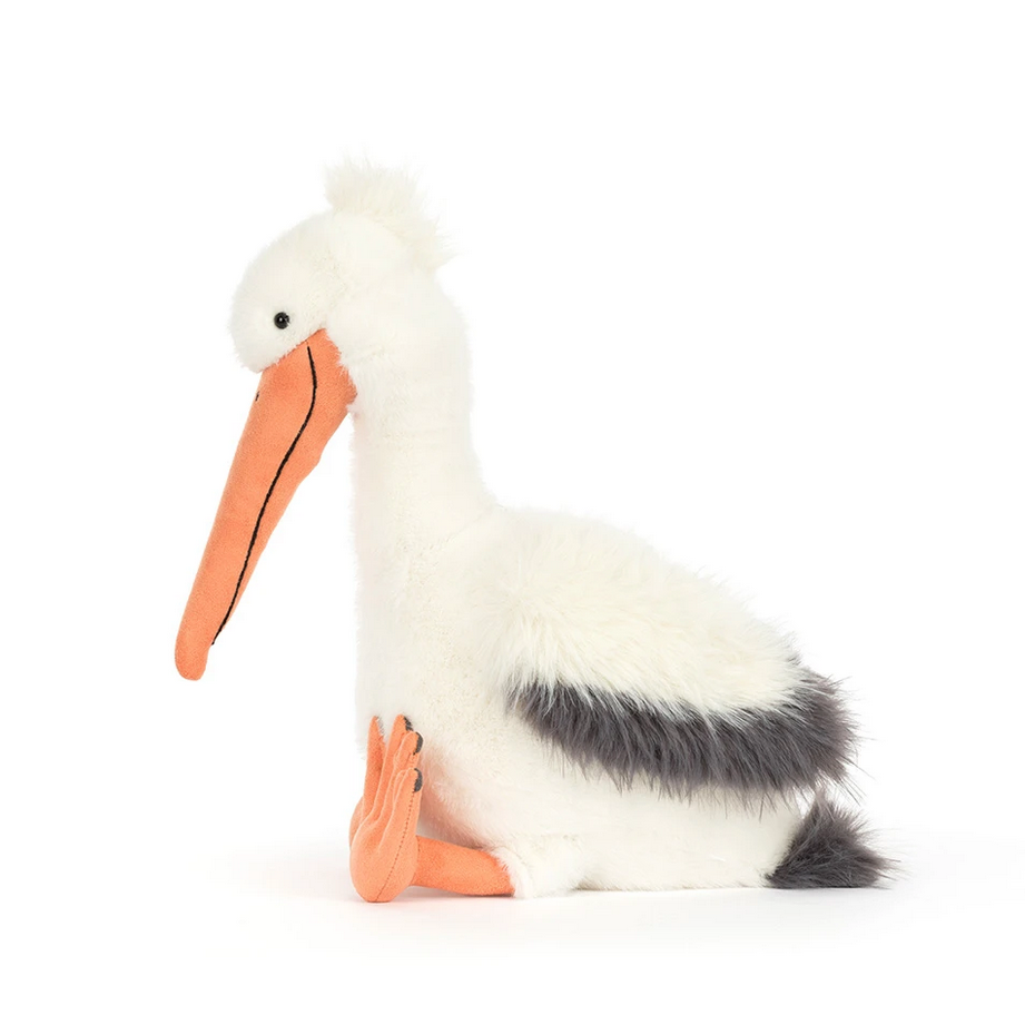 Stuffed pelican toy on a white background