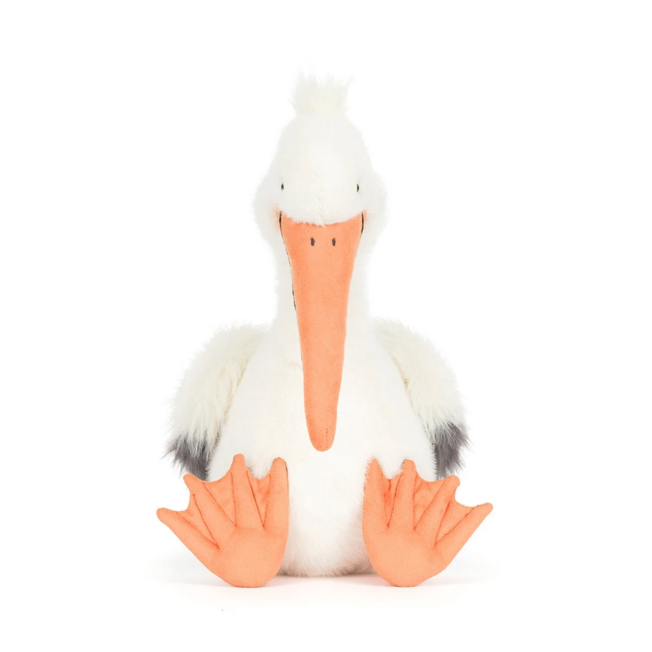 Plush pelican toy on a white background