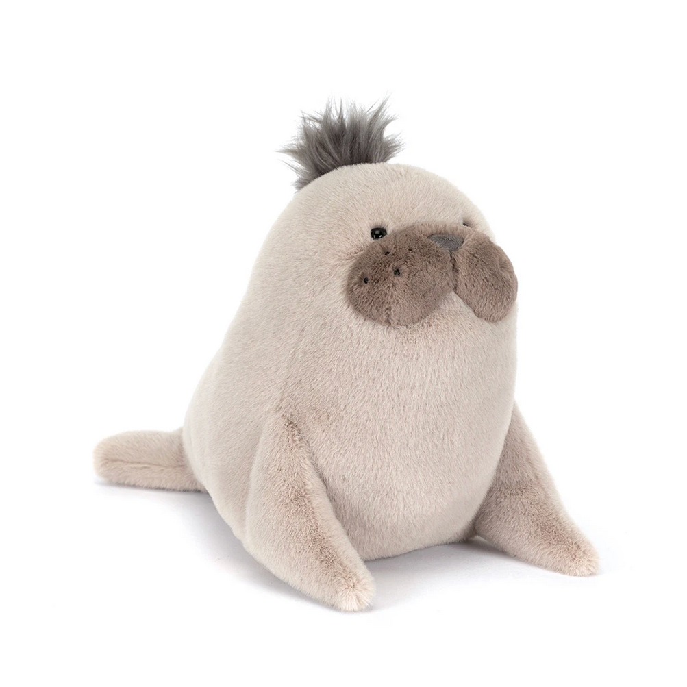 Plush toy seal on a white background