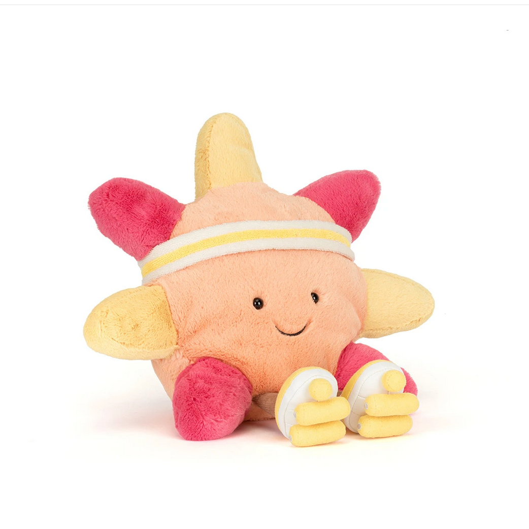 Plush toy resembling a sun with roller skates 