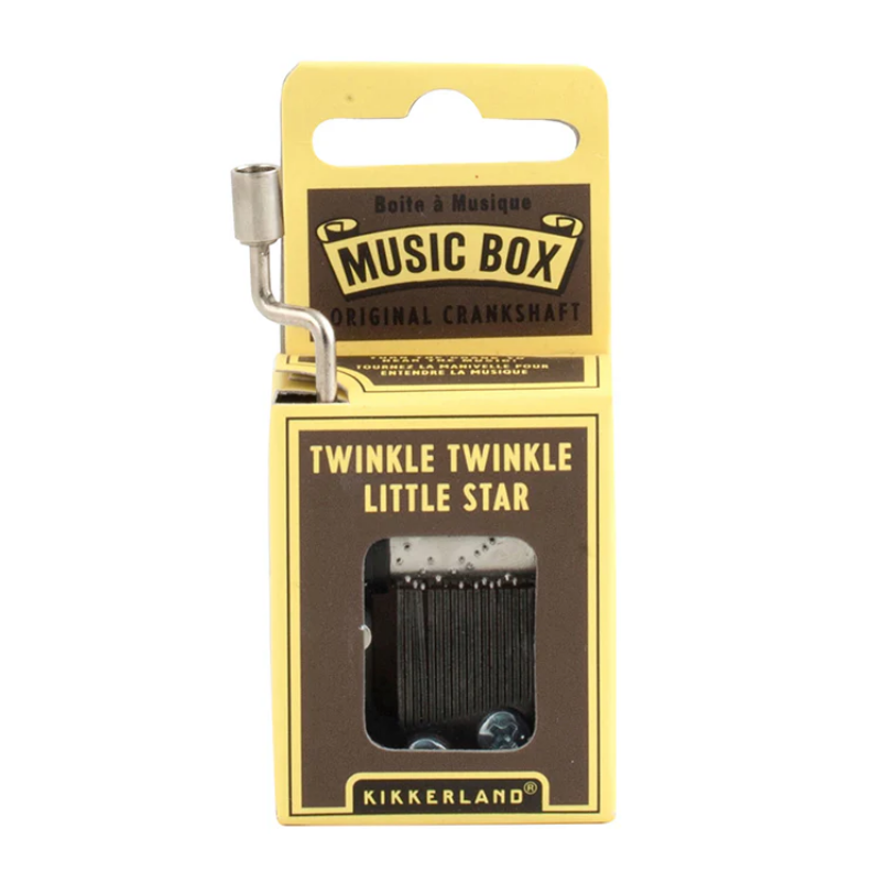 Music box in packaging with 'Twinkle Twinkle Little Star' text on a white background