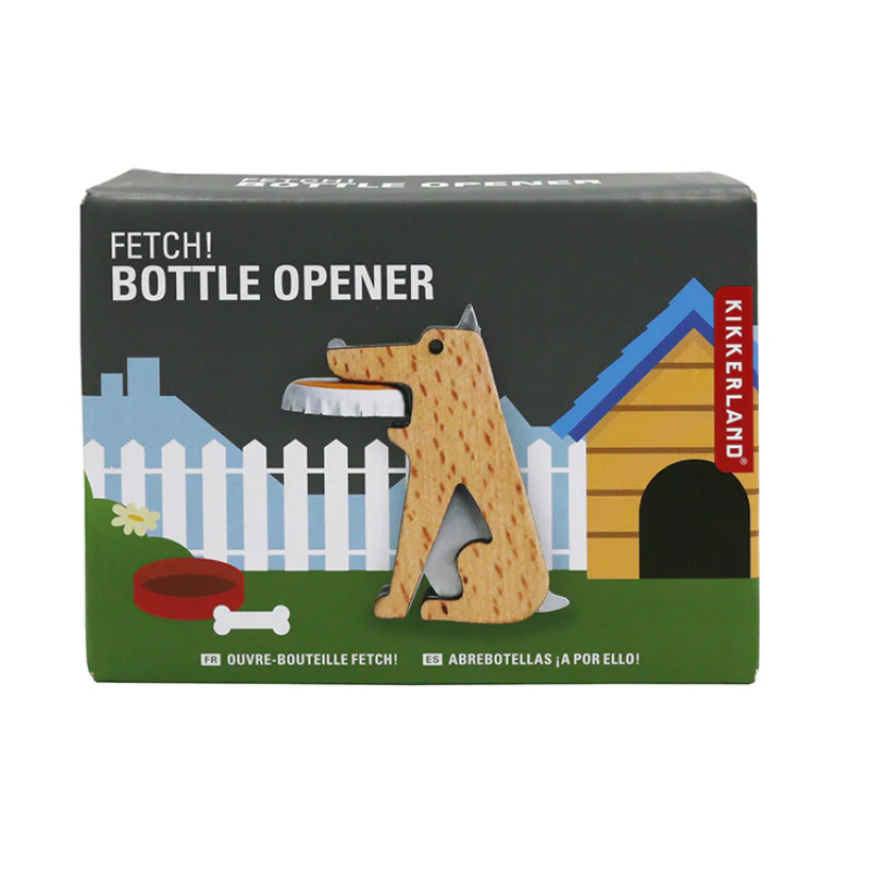 Bottle opener shaped like a dog with packaging featuring a doghouse and fence illustration, branded as Kikkerland.