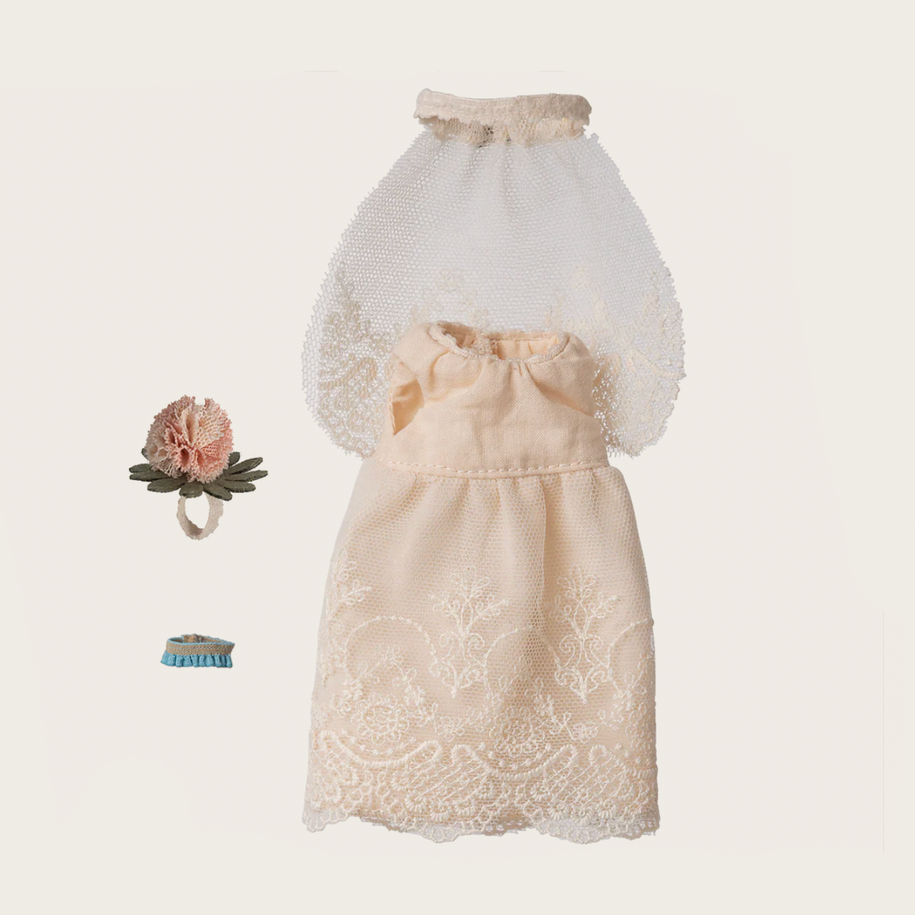 White lace dress with a floral headpiece on a white background